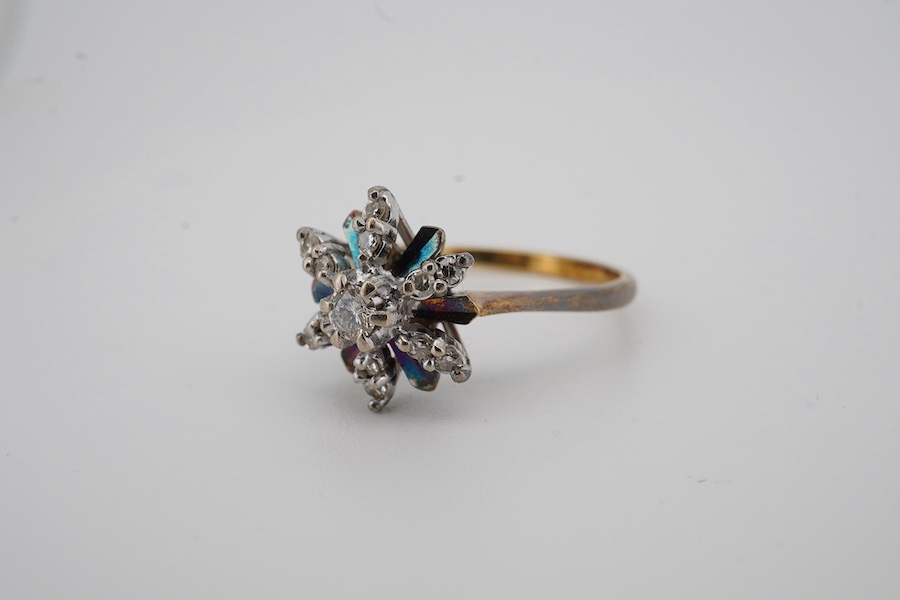 A Victorian 15ct gold, turquoise and seed pearl set marquise shaped ring, size N, together with an 18ct and diamond cluster set flower head ring, with 'coloured' petals, size O, gross weight 6.1 grams. Condition - fair